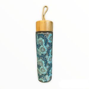 Coconut girl aesthetic 20 ounce glass water bottle with bamboo lid blue floral